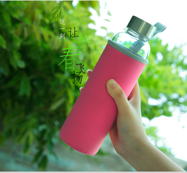 Glass sports water bottle with tea infuser and cover.