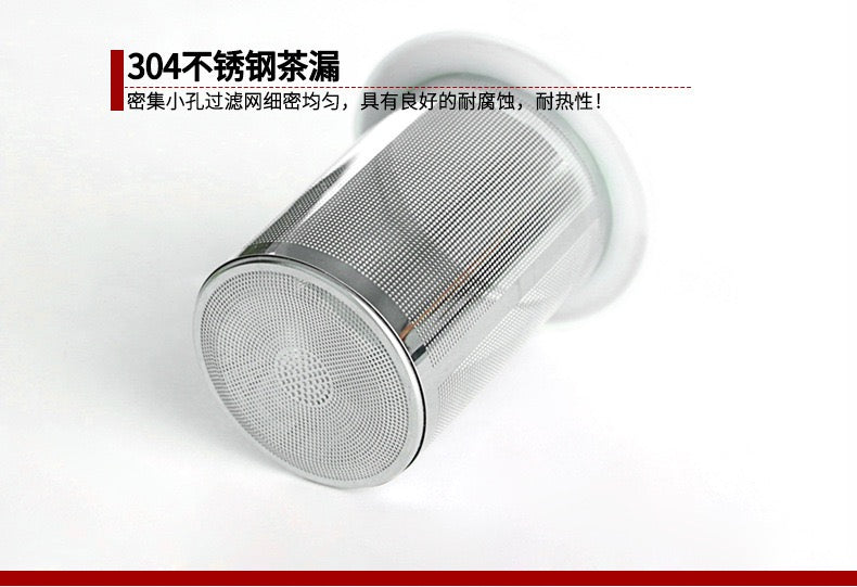 Glass sports water bottle with tea infuser and cover.